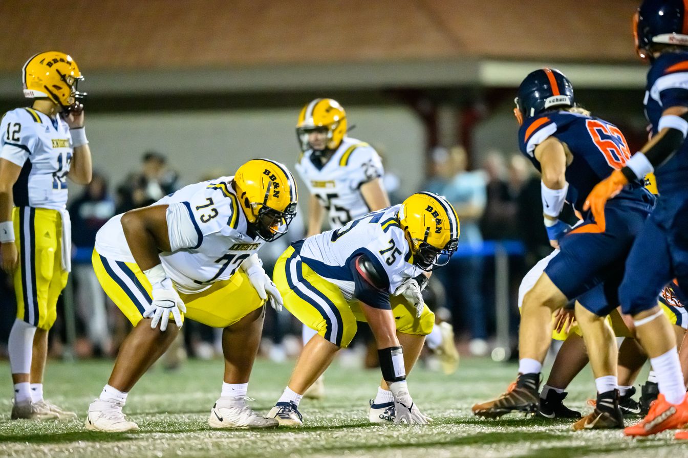 football team on field.