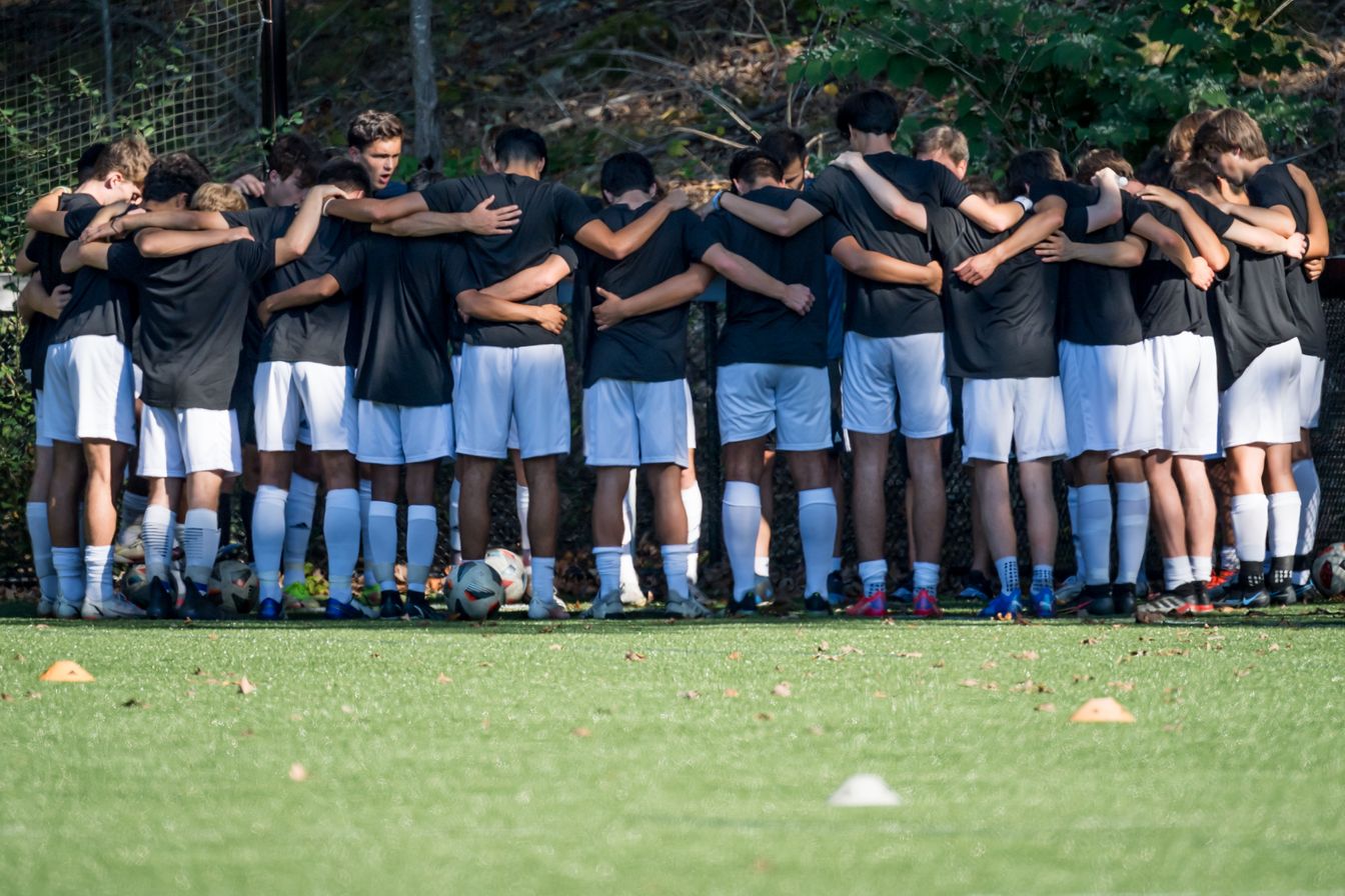 soccer team huddle.