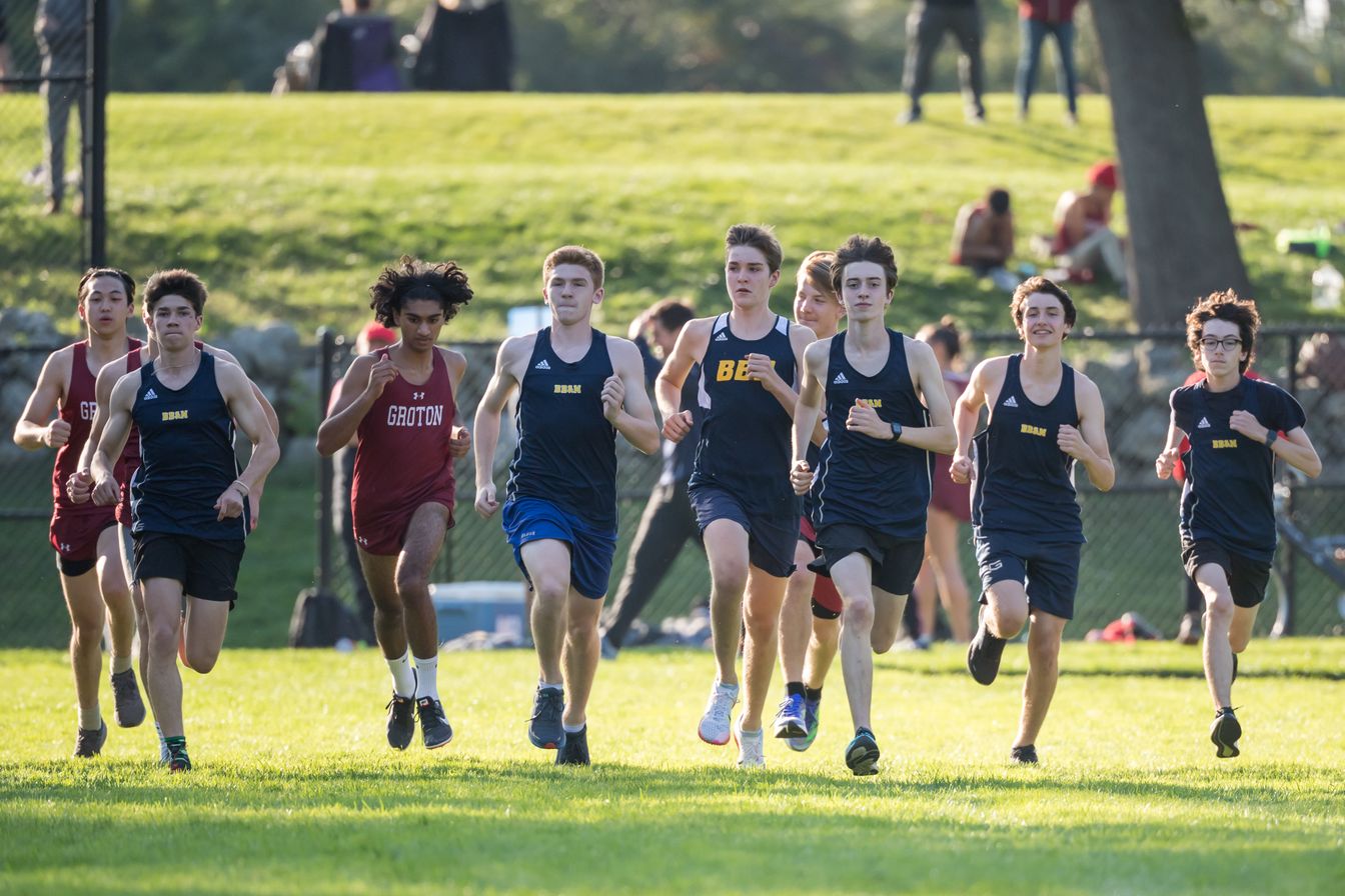 boys cross country team running.