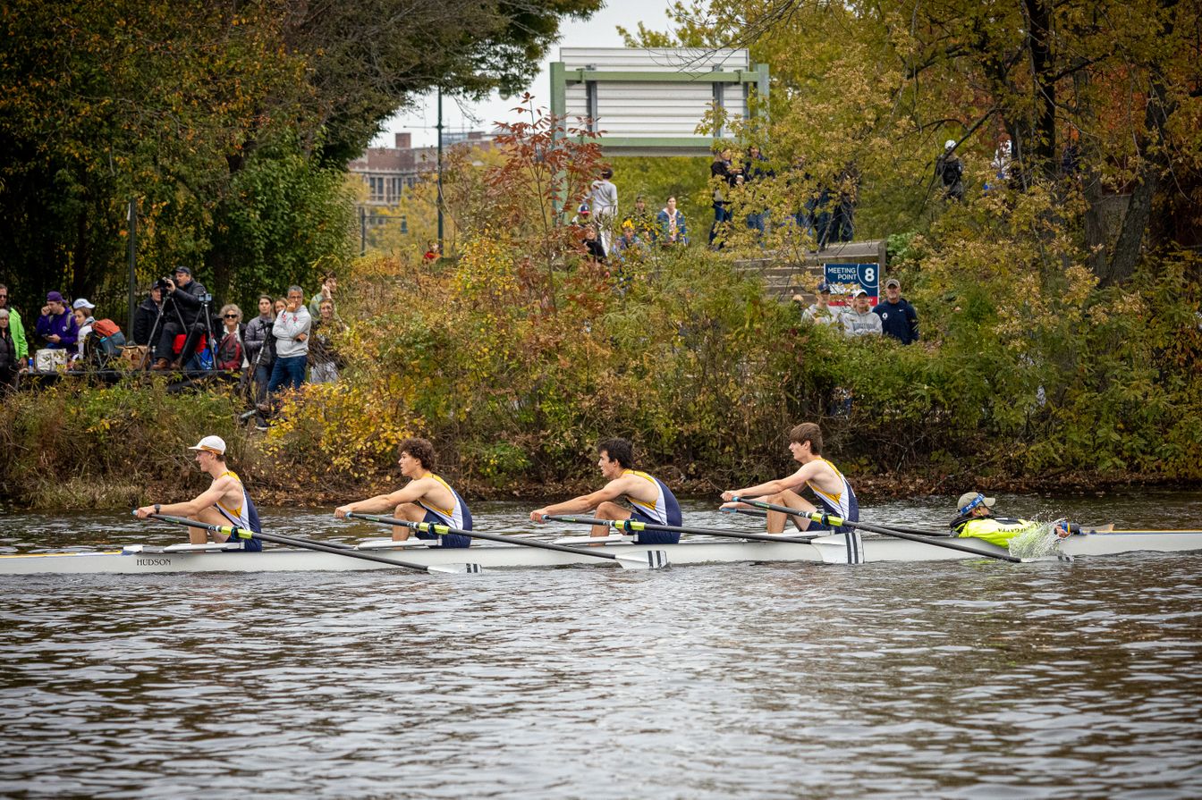 boys crew team in the water.