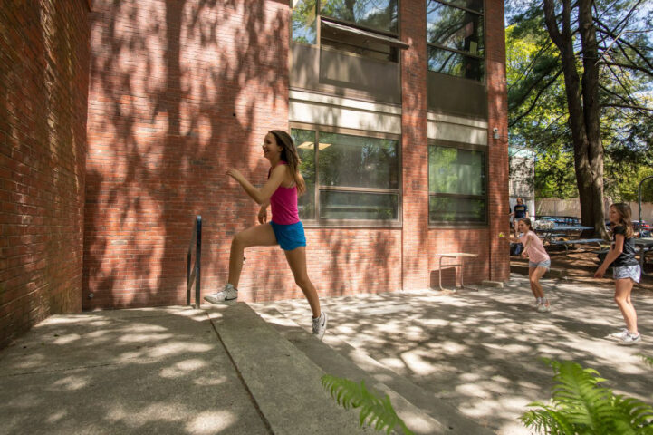 girls playing outside school.