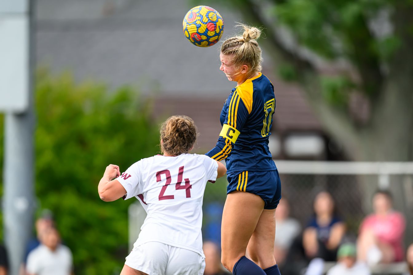 girls soccer team in action.