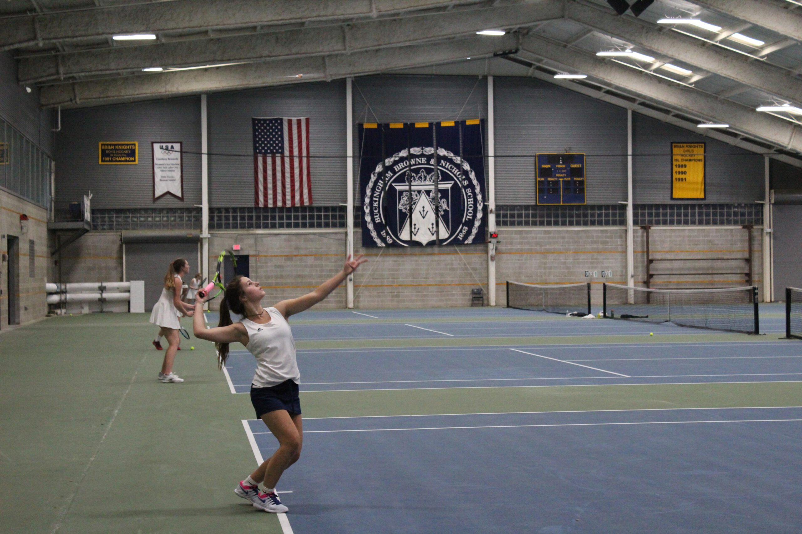 girl in tennis match.