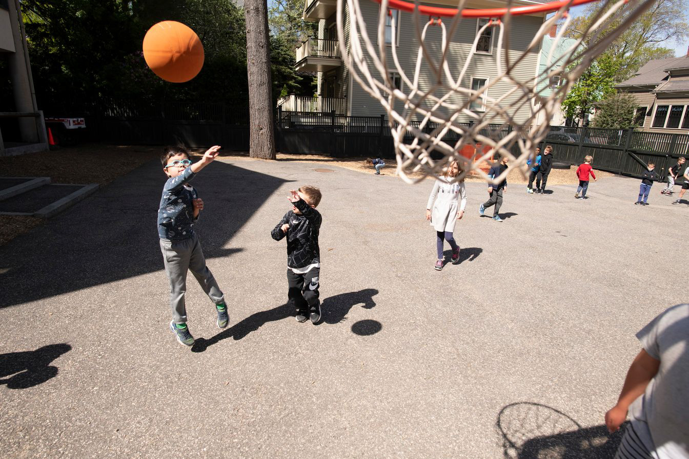 children playing basketball.