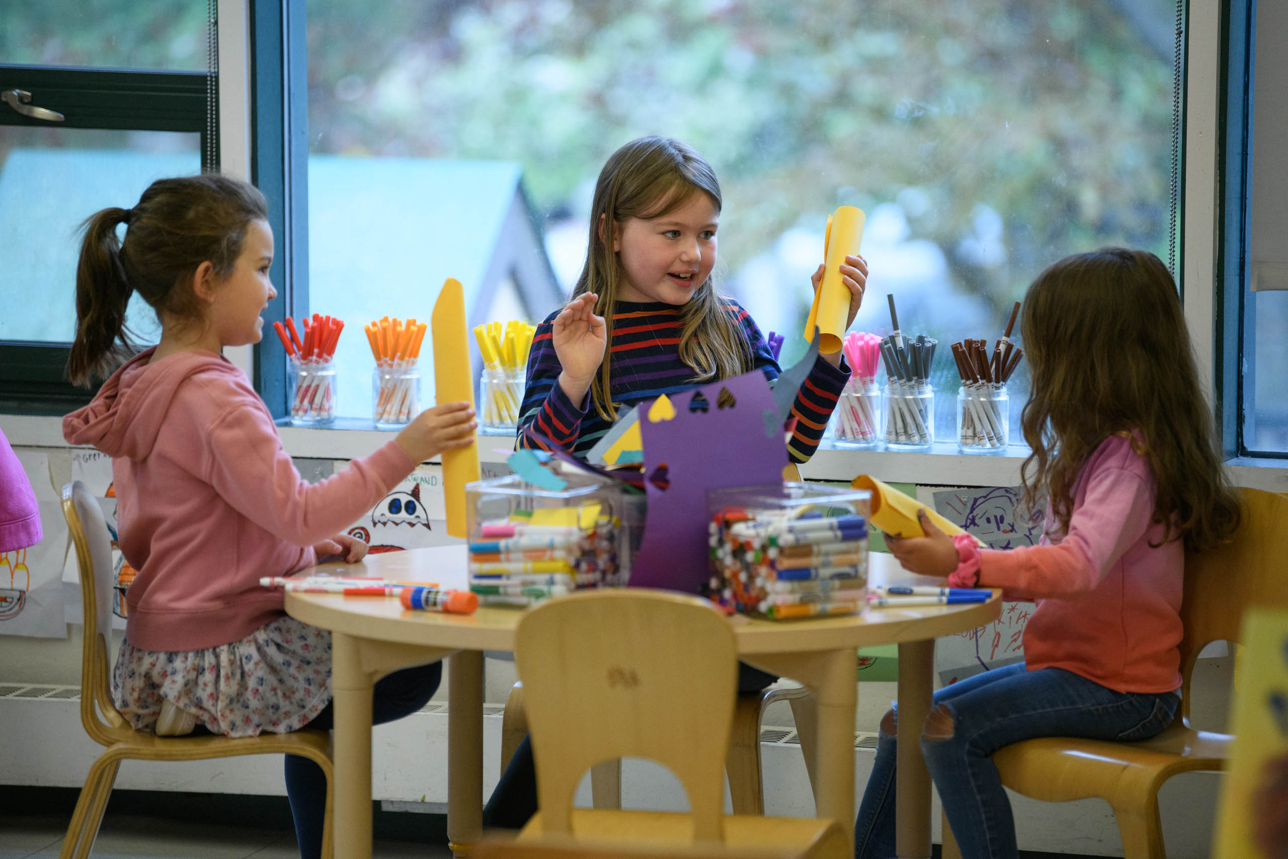 young students doing arts and crafts.