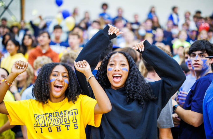 students cheering.