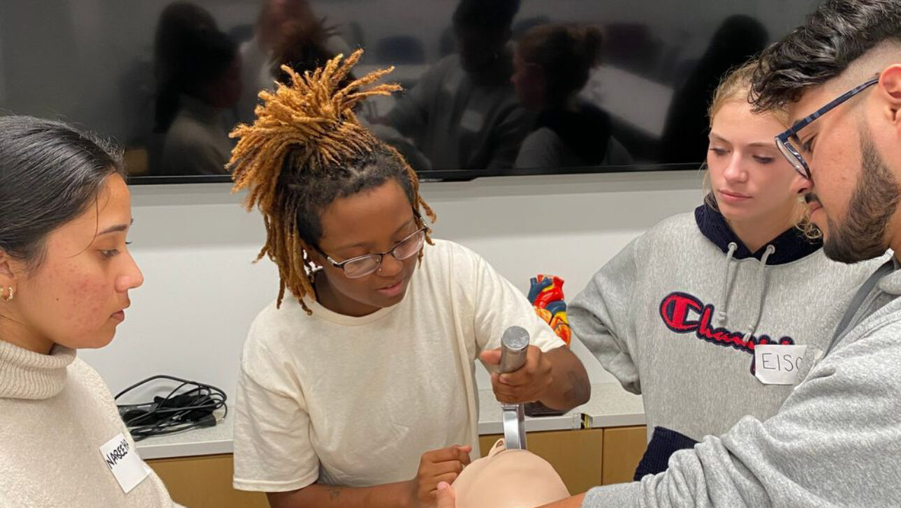 students learning cpr.