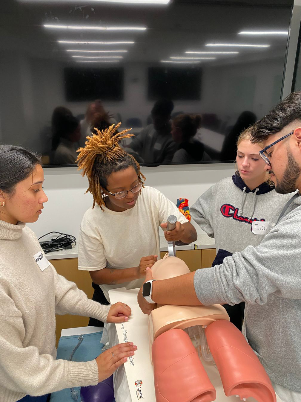 students learning cpr.