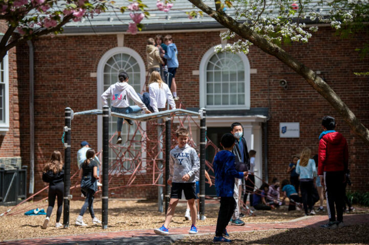 students playing on playground.