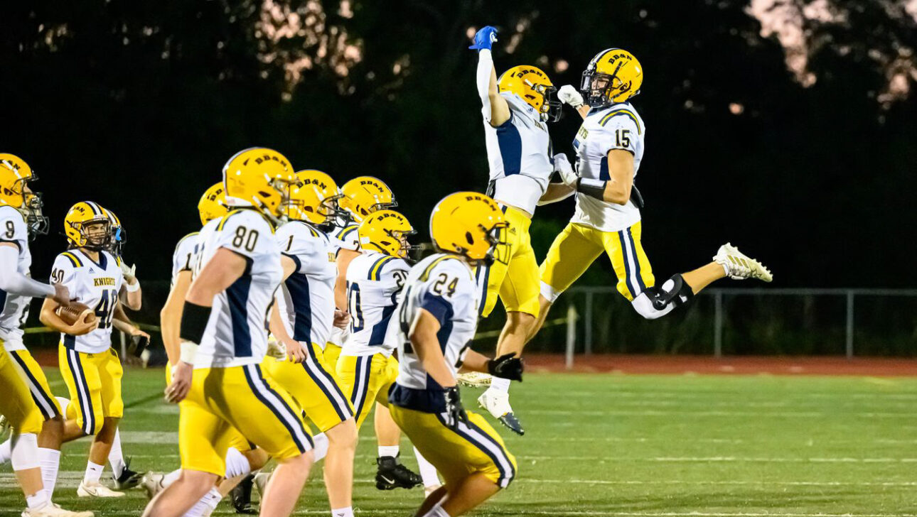 football team celebrating.