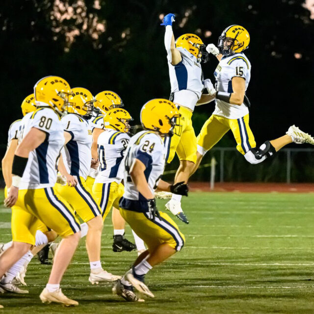 football team celebrating.