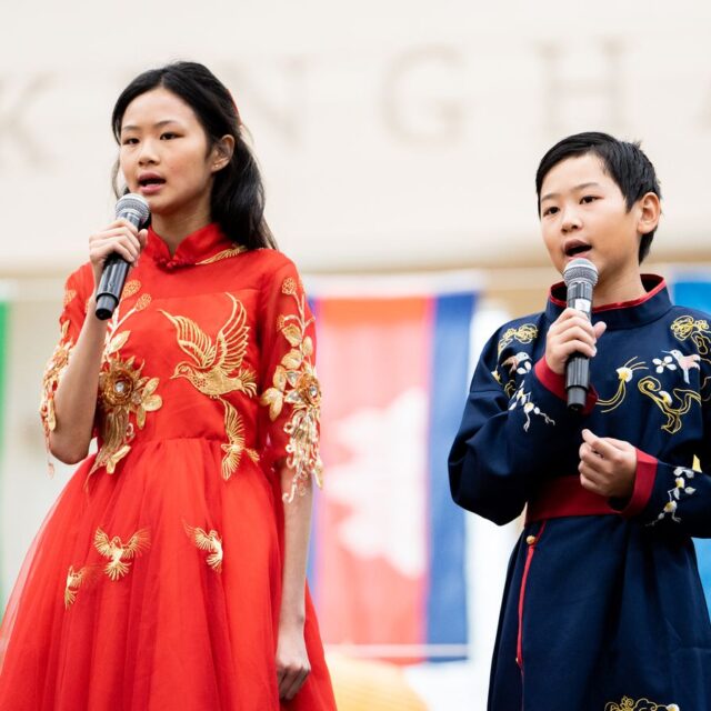 two students singing