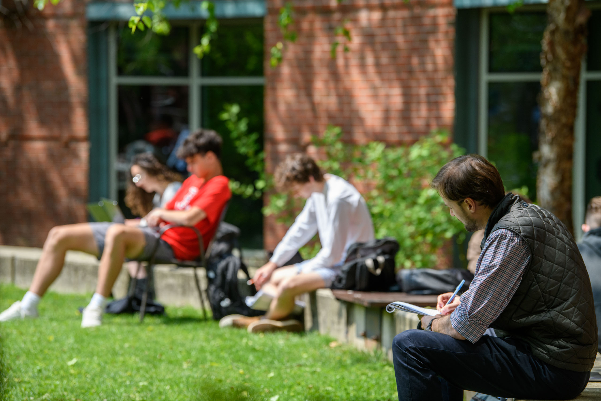 students studying outside.